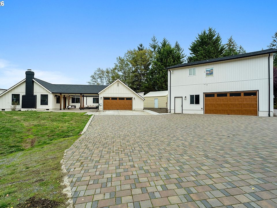Paver motor court with detached shop